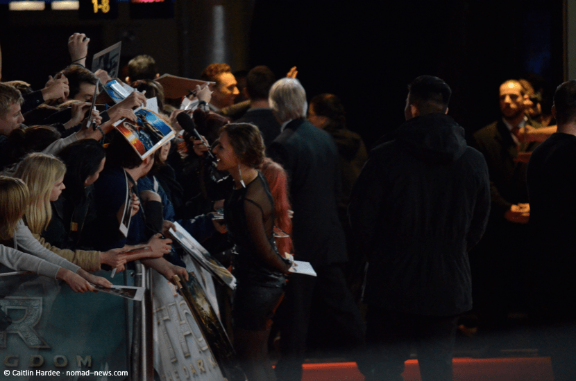 Tom Hiddleston waving goodbye to his fans at the Berlin premiere of "Thor 2." Copyright Caitlin Hardee