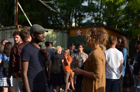 Festival attendees chilling outside at Gretchen.